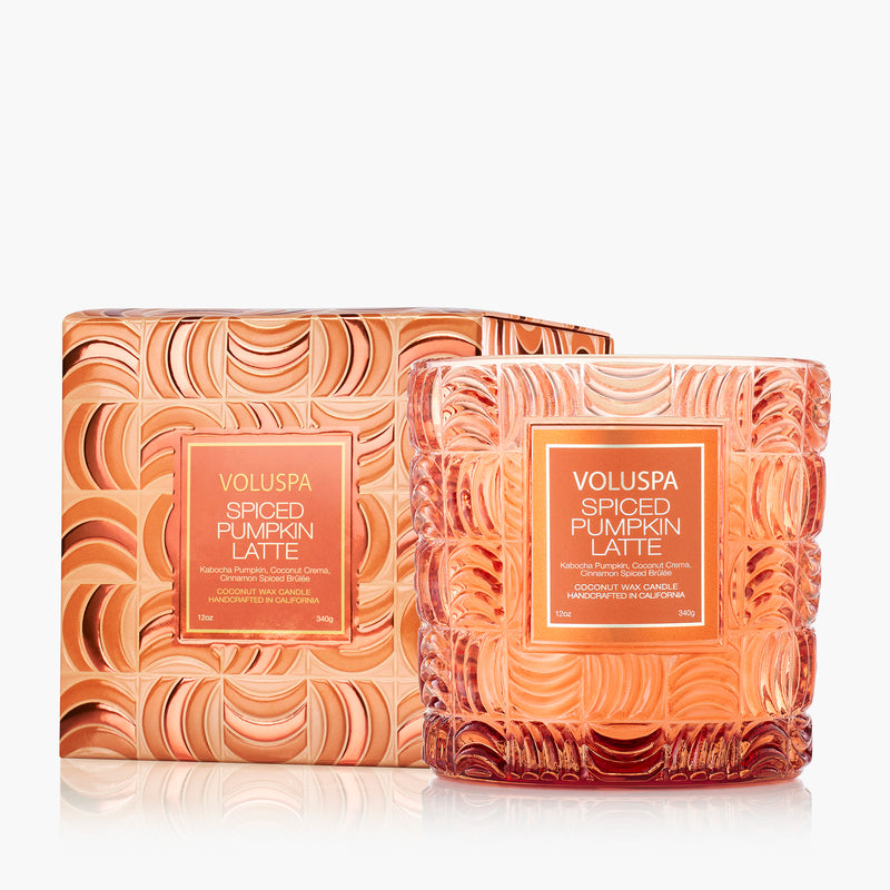 Voluspa Spiced Pumpkin Latte 12oz candle in a textured orange glass jar next to its matching box.