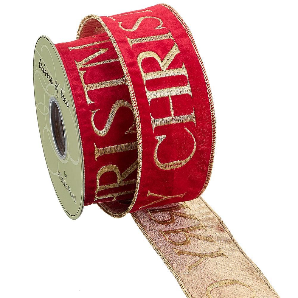 2.5-inch red velvet ribbon with gold embroidered Merry Christmas text on a spool.