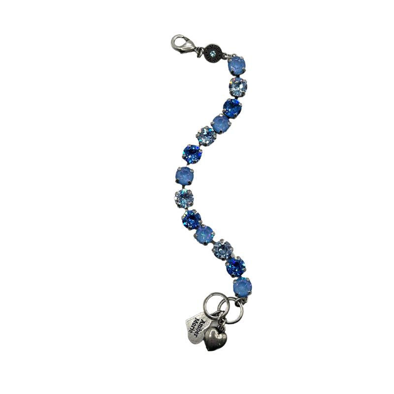 Classic Santorini bracelet with blue ombre stones, amber tag, crystal accent, and Scotty dog heart charm.