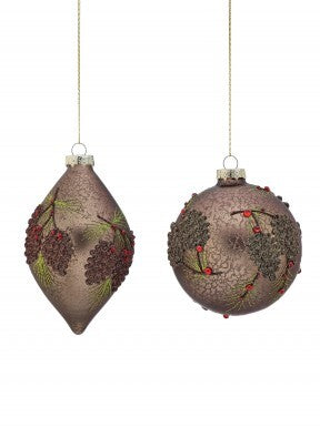 Two brown glass ornaments with pinecone and jewel accents, one teardrop and one round shape.
