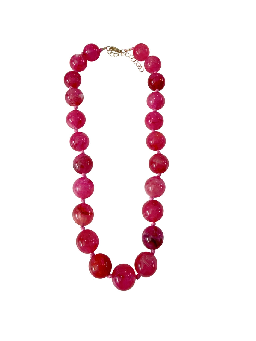Mabry Chunky Beaded Necklace featuring large, glossy marbled maroon stone beads.