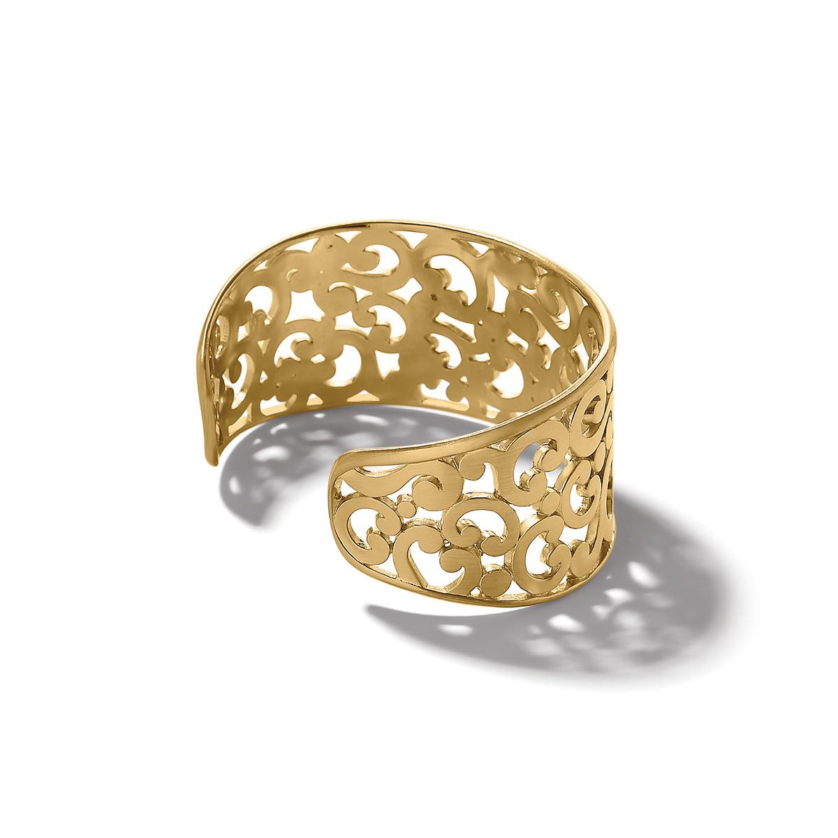 Gold plated Contempo wide cuff bracelet with an intricate openwork scroll design.