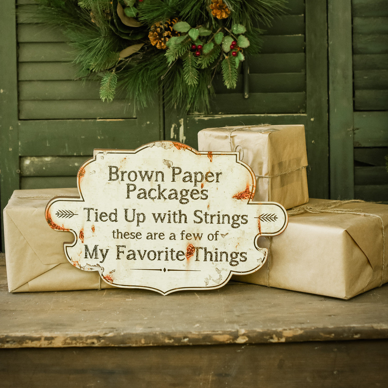 Metal wall sign with the word 'Favorite Things' in a decorative font.