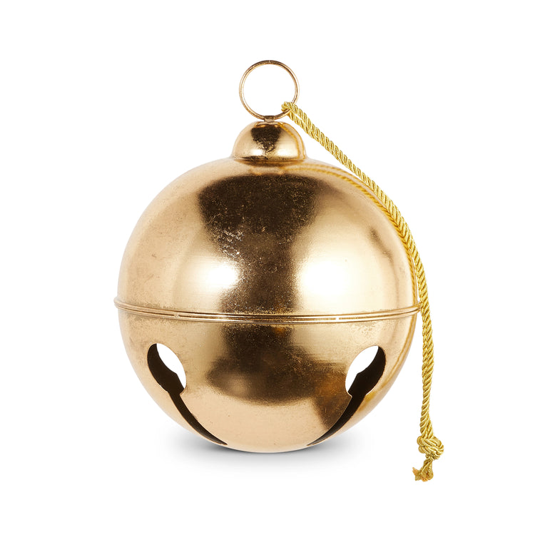 Large gold metal jingle bell ornament with a gold hanging cord on a white background.