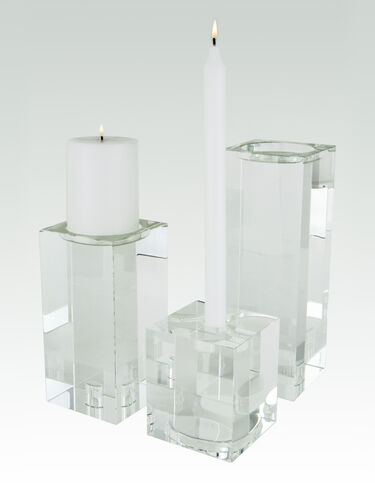 Clear crystal glass pillar candle holder with a sleek cylindrical shape.