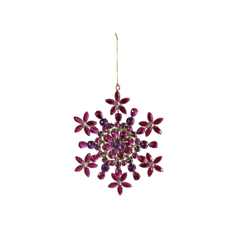 Metal snowflake ornament with pink and purple acrylic jewels and a gold hanging string.