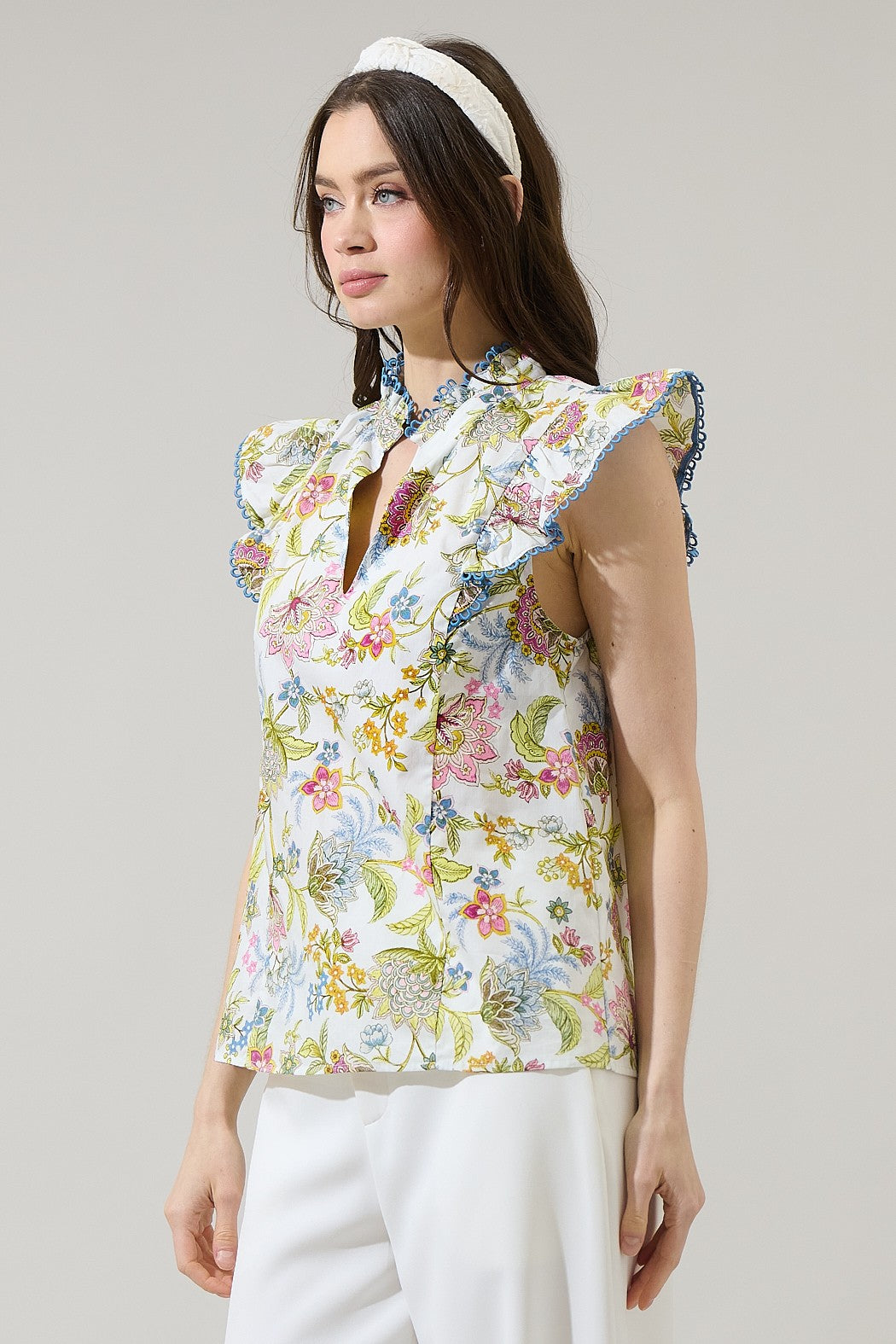 Elsa Pany Rayen ruffle top in floral print cotton fabric with a relaxed silhouette.