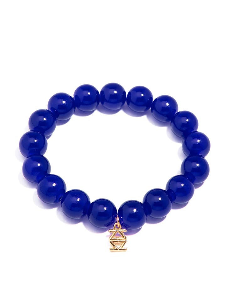Stretch bracelet with glossy lucite glass beads in a single-color pattern.