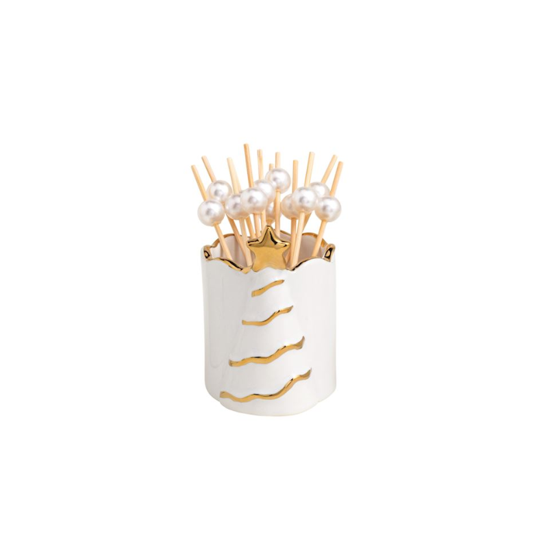 White stoneware toothpick caddy with gold Christmas tree motif and pearl-topped wooden toothpicks.