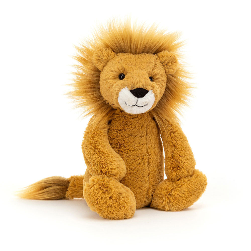 Bashful Lion Medium plush toy in beige polyester with acrylic mane sitting on a soft base.
