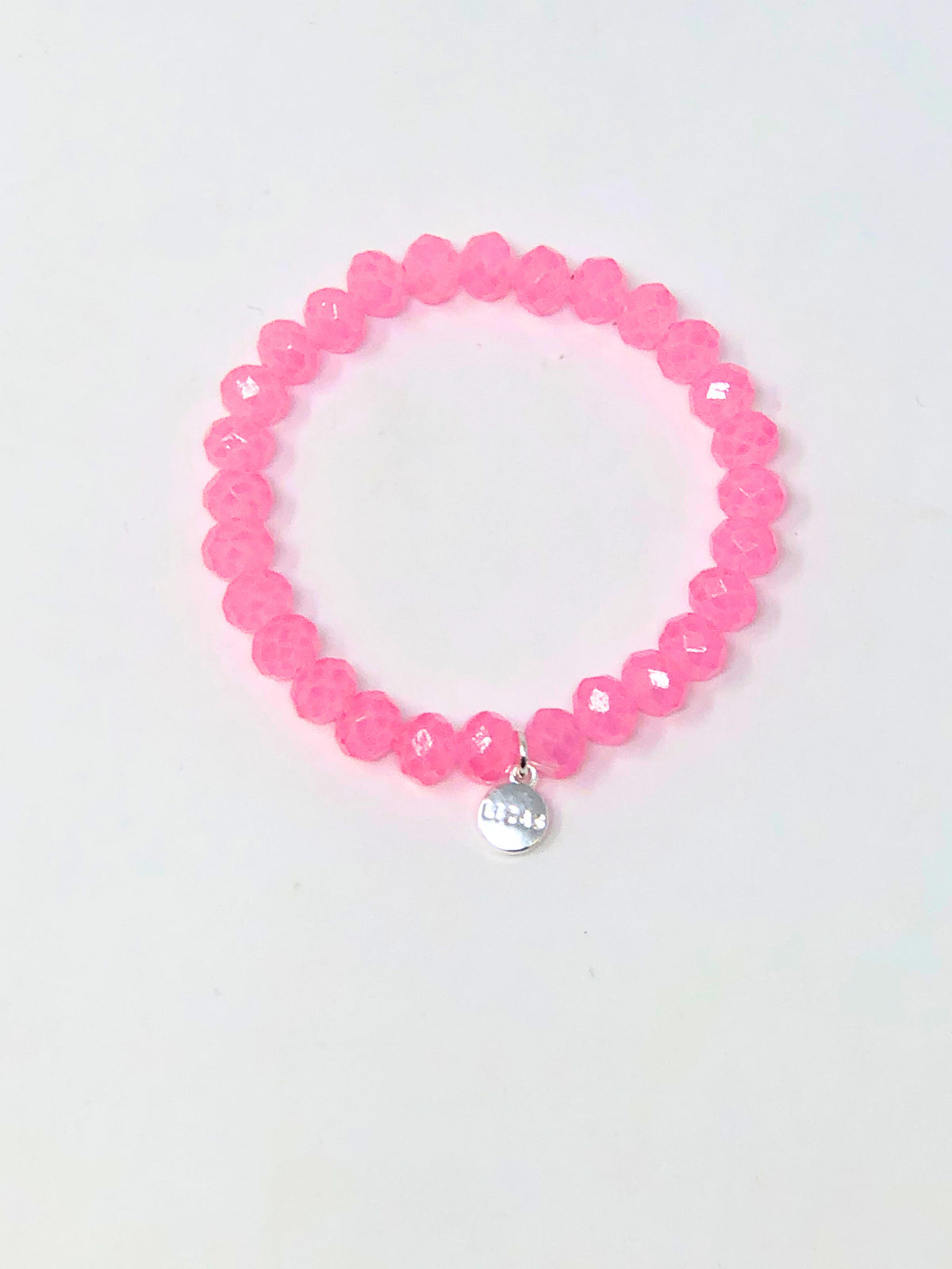 Stretchy bracelet with faceted glass beads in a colorful beaded pattern.