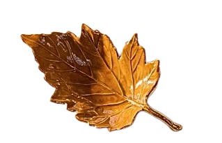 Glossy brown enamel leaf-shaped tray with textured vein detailing and a metallic finish.