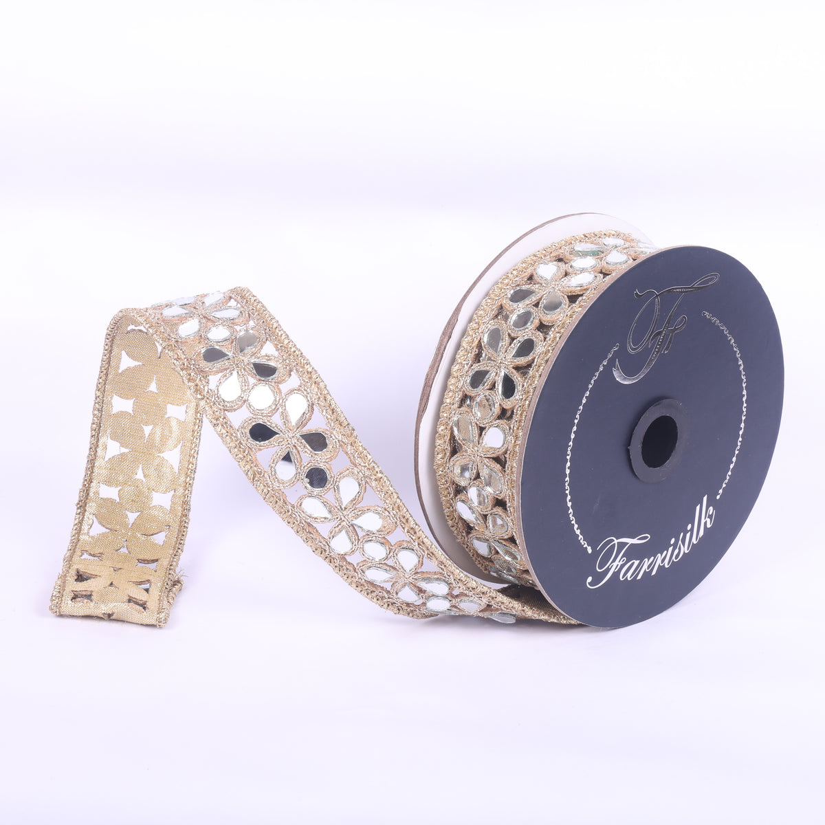 1 inch wide golden shard ribbon with mirror-like accents on a 5 yard spool.