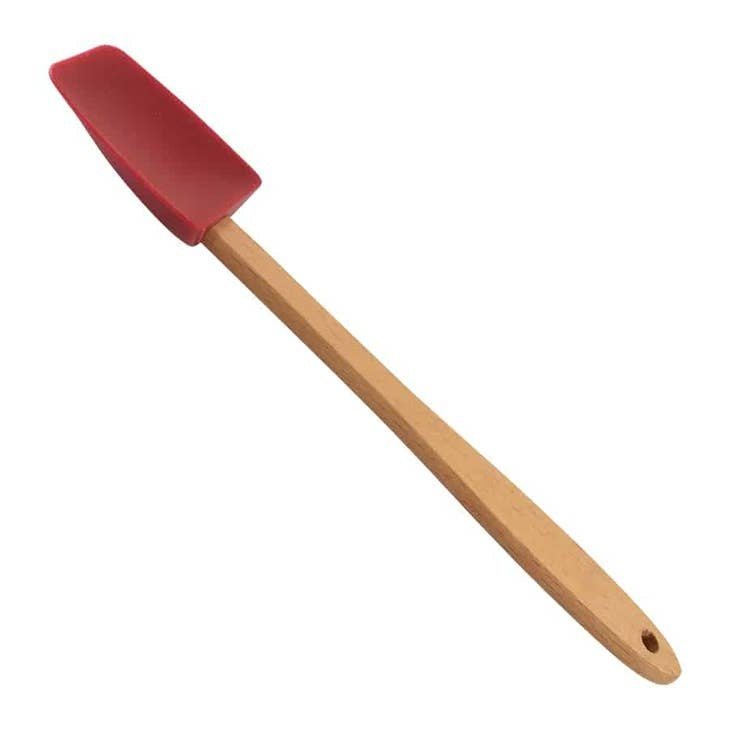 Mini silicone spatula with a compact handle designed to slide under delicate foods.