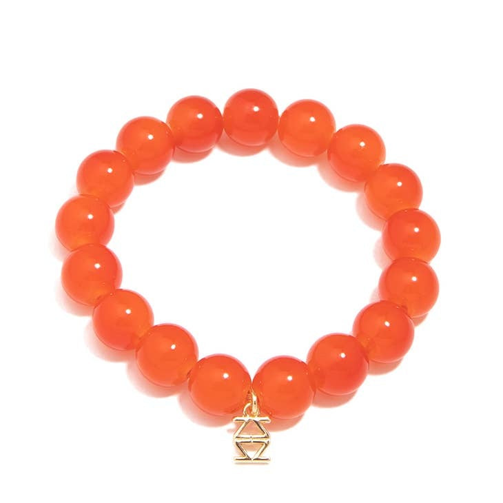 Stretch bracelet with glossy lucite glass beads in a single-color pattern.