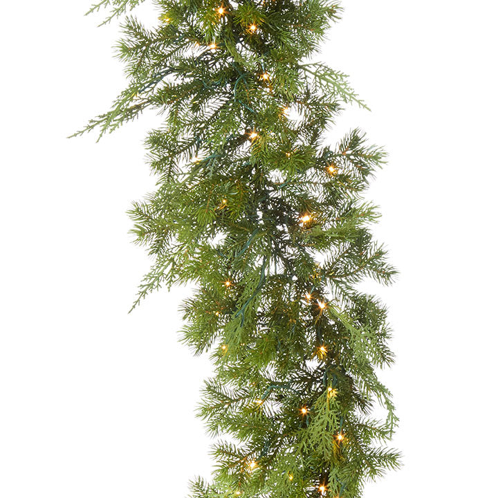 9' mixed cedar and pine garland with 200 warm white LED snake lights on a white background.