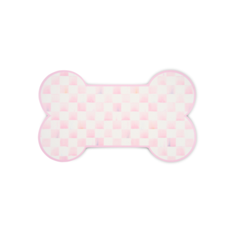Bone-shaped placemat with a pink and white watercolor checkered pattern and a pink border.