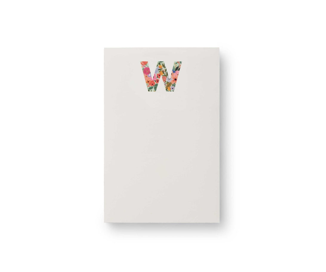 Garden Party monogram notepad with tear-off sheets in a floral pattern.