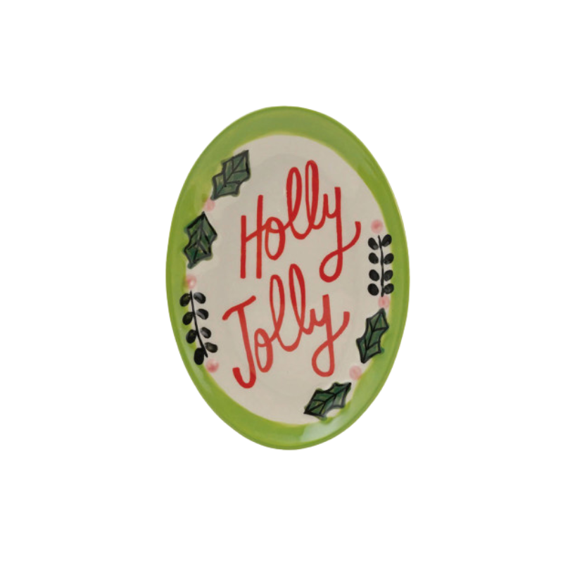 Oval stoneware dish with a green rim and red cursive 'Holly Jolly' text with holly leaf accents.