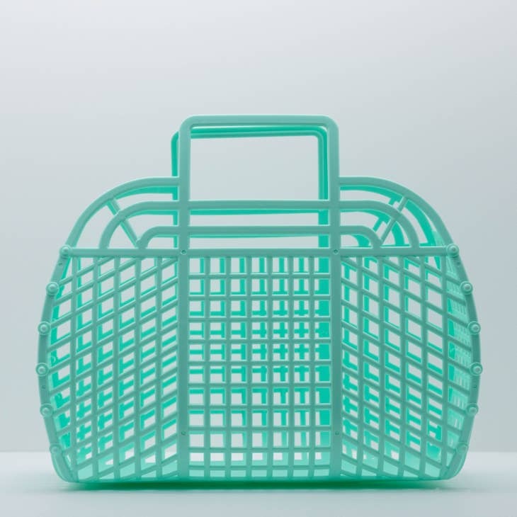 Large retro jelly basket in translucent blue with snap-bead construction.