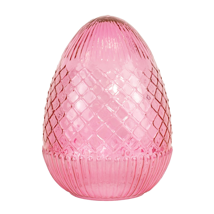 Handcrafted Annalise glass egg with vivid hue and intricate surface details.