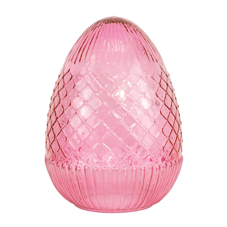 Handcrafted Annalise glass egg with vivid hue and intricate surface details.