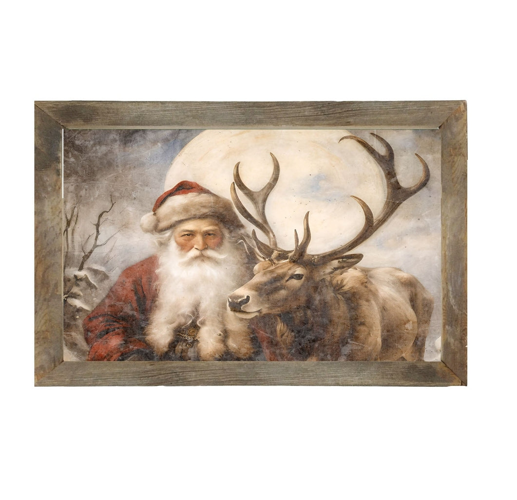 Horizontal wooden frame featuring a mounted print of Santa with reindeer.