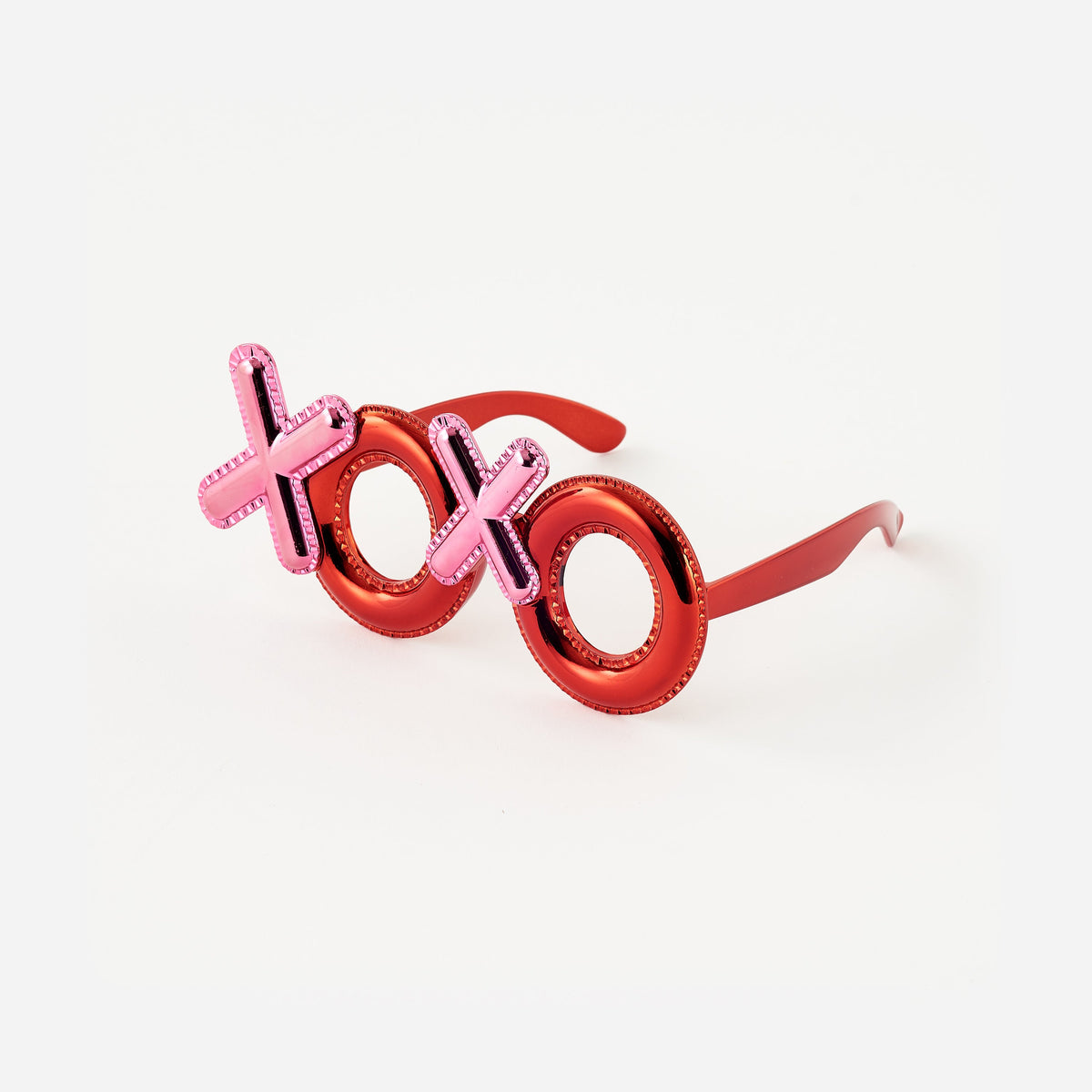 XOXO PVC sunglasses with a black frame featuring heart-shaped lenses.