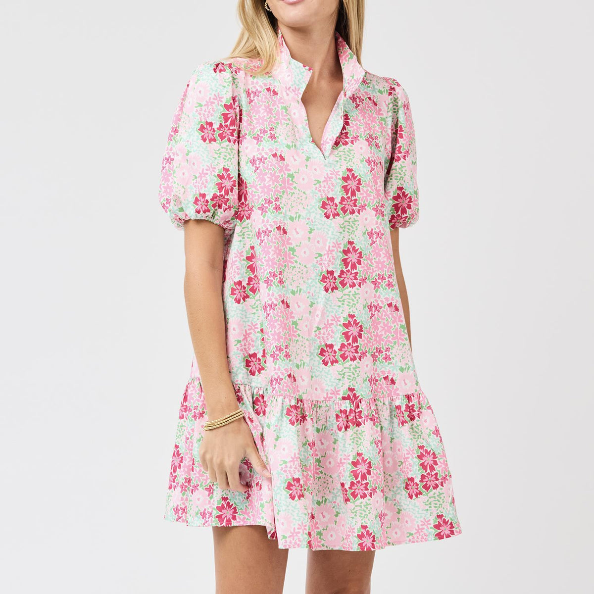 Nancy Petal Dress in light pink floral print with a flowing A-line silhouette and short sleeves.