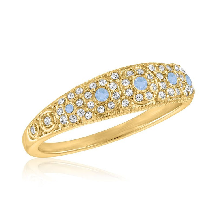 Vintage detailed gold ring featuring light blue and clear cubic zirconia in a pavé setting.
