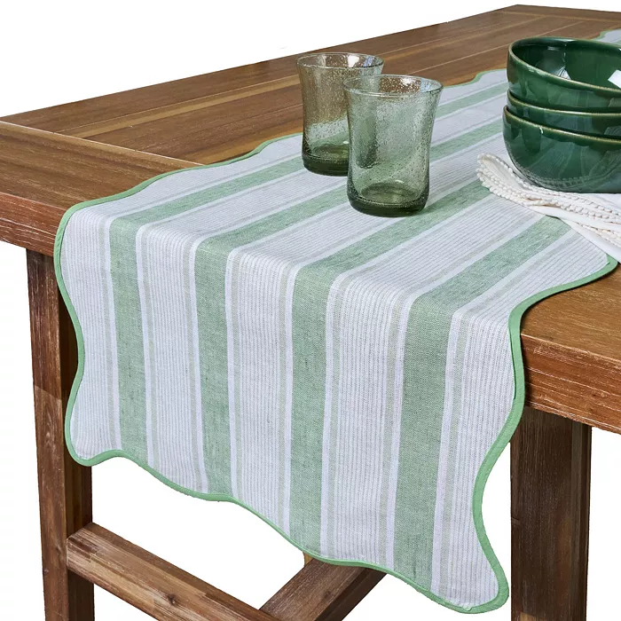 Scalloped-edge table runner in candy-colored seagrass with classic cabana stripes.