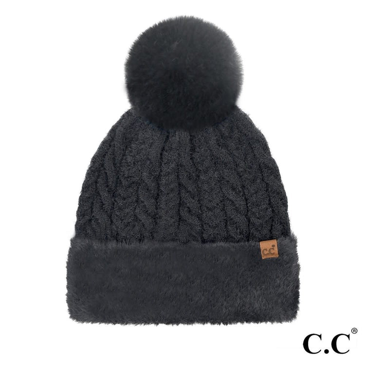 Black cable knit beanie with faux fur cuff and pom detail