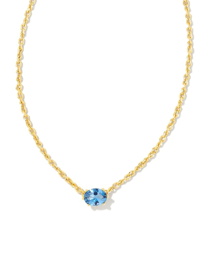 Gold pendant necklace featuring a purple crystal Cailin charm on an adjustable chain.