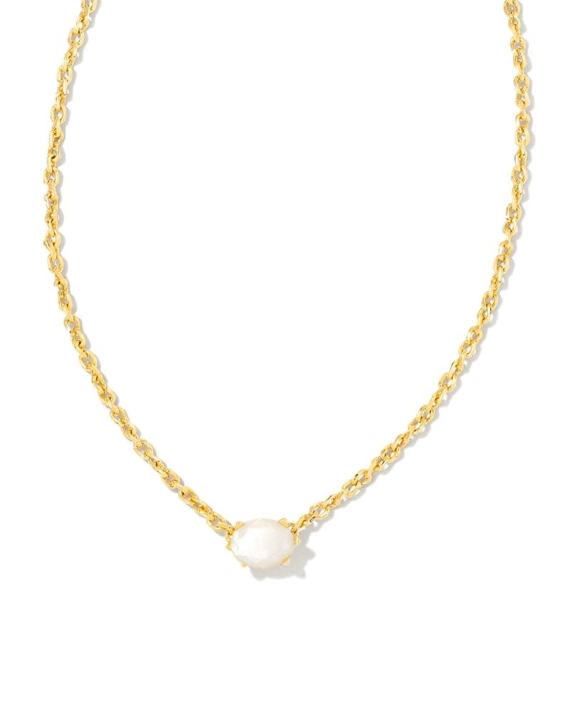 Gold chain necklace with a purple crystal pendant featuring an ivory mother-of-pearl silhouette.