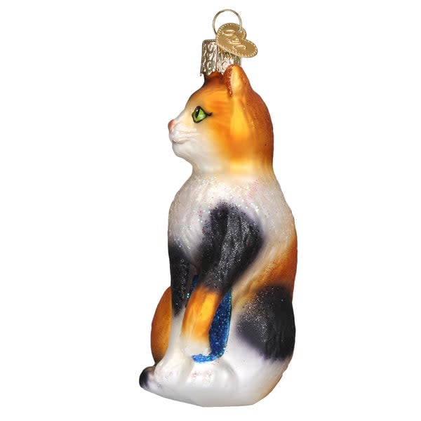 Glass ornament shaped like a calico cat with white, orange, and black fur patterns.