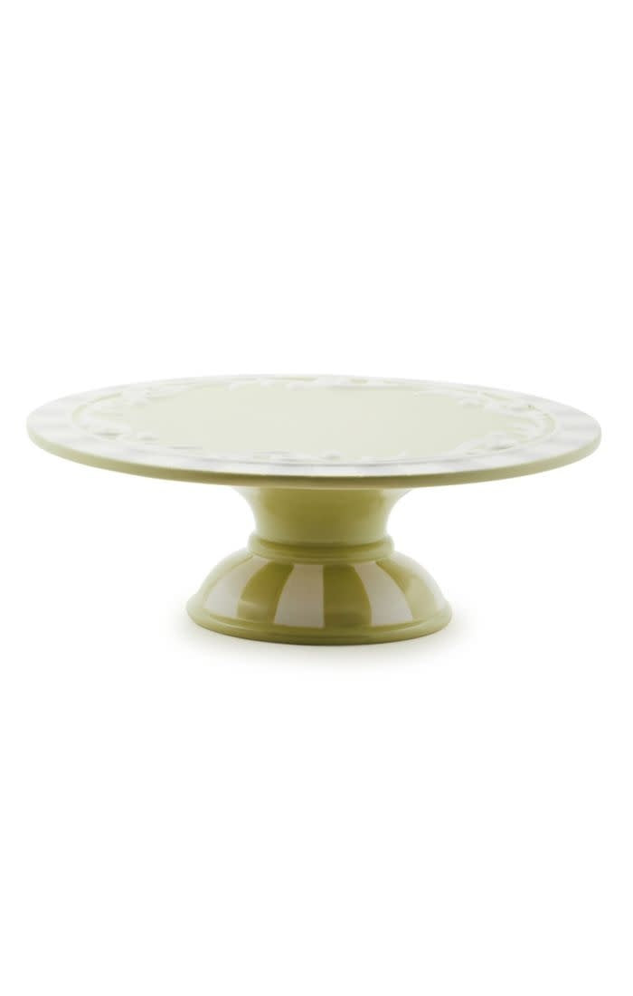 Large dolomite ceramic pedestal platter with a natural stone finish.