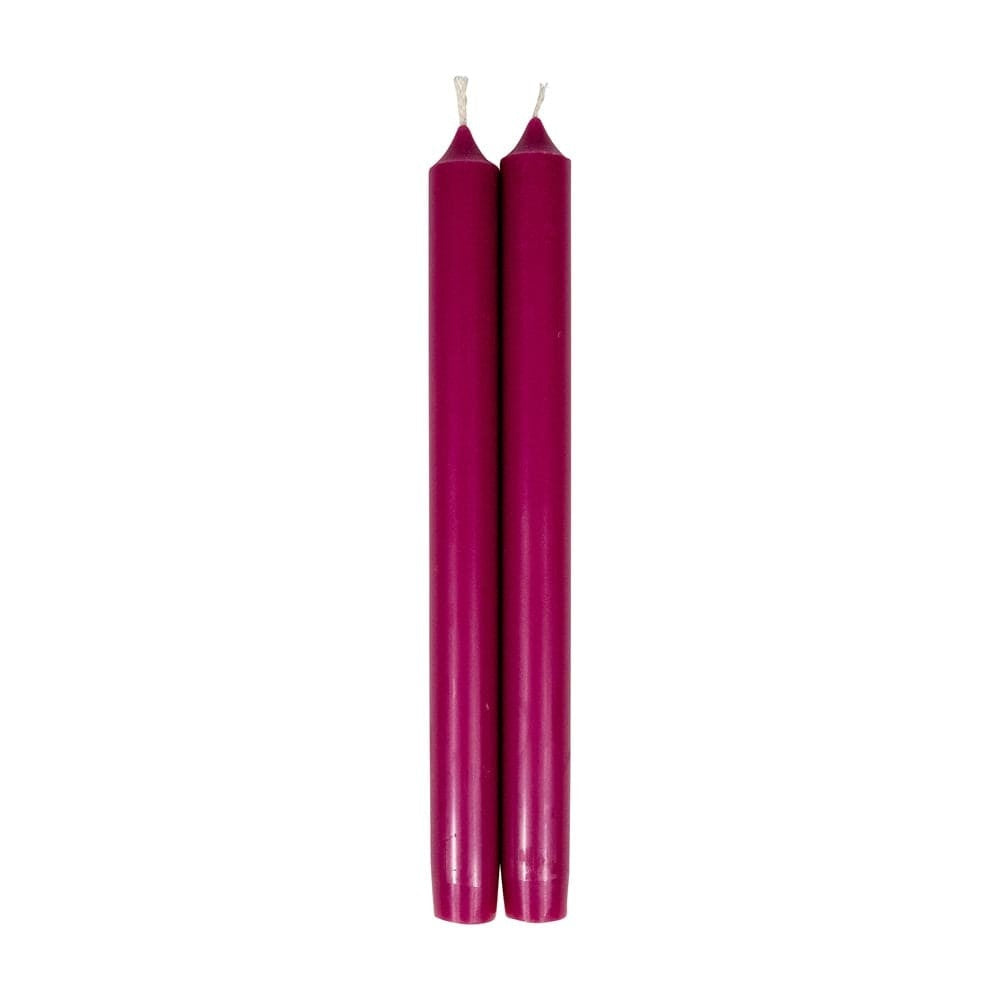 A pair of 10-inch raspberry-colored taper candles with a smooth finish and cotton wicks.