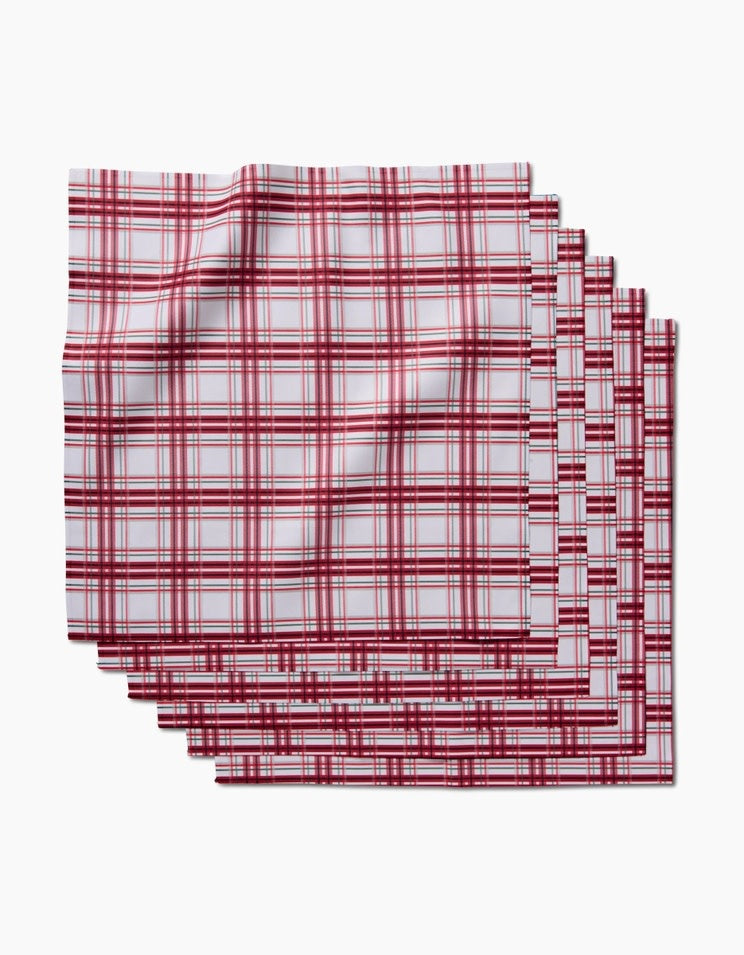 Set of six candy-cane plaid Geosuede dinner napkins made from recycled fabric.