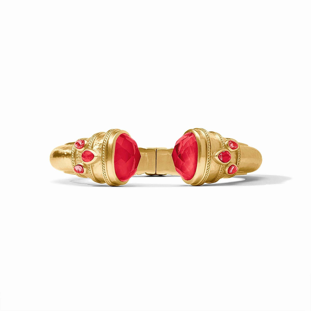 Gold cuff bracelet with rose-cut endcaps, pear gemstones, freshwater pearl, and mother-of-pearl details.