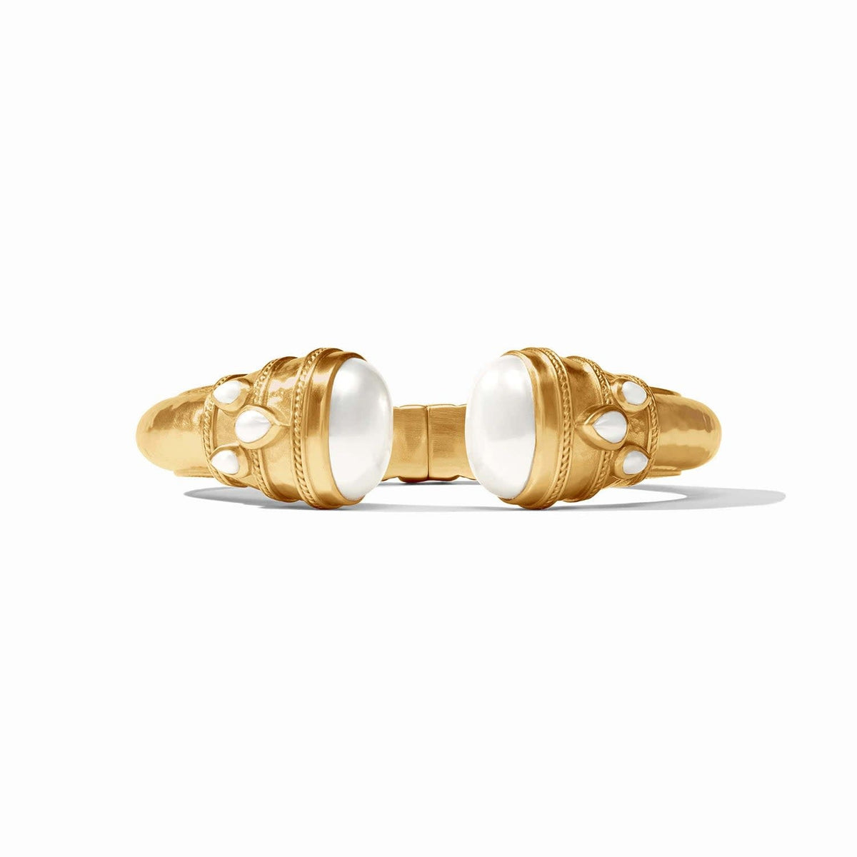 Gold cuff bracelet with rose-cut endcaps, pear gemstones, freshwater pearl, and mother-of-pearl inlay.