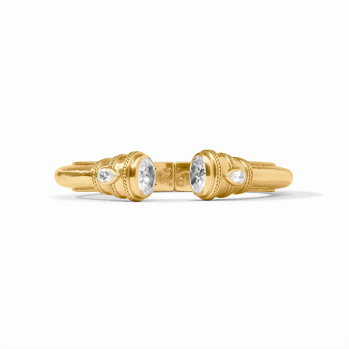 Demi cuff bracelet with gilded shank, shell pearl endcaps, pear-shaped gemstones, and mother-of-pearl accents.