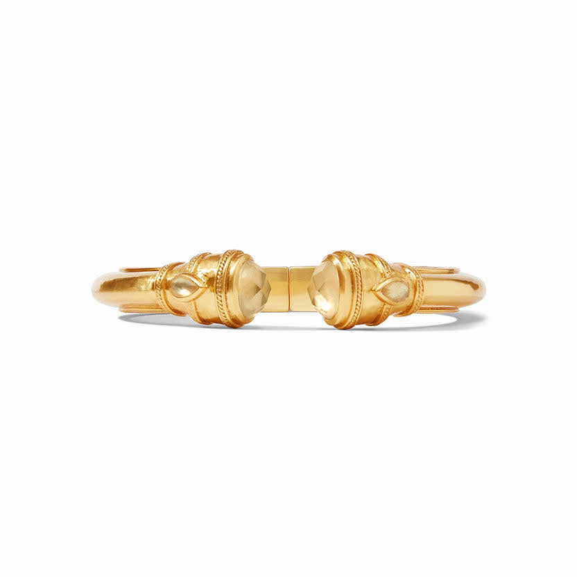 Cannes Demi Cuff in iridescent champagne with shell pearl endcaps and pear-shaped gemstones on a gilded shank.