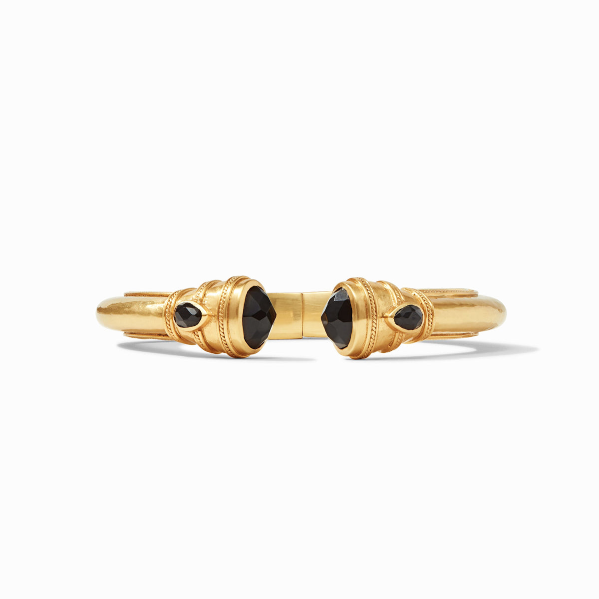 Obsidian black Cannes Demi Cuff with pear-shaped gemstones on a gilded shank and shell pearl endcaps.