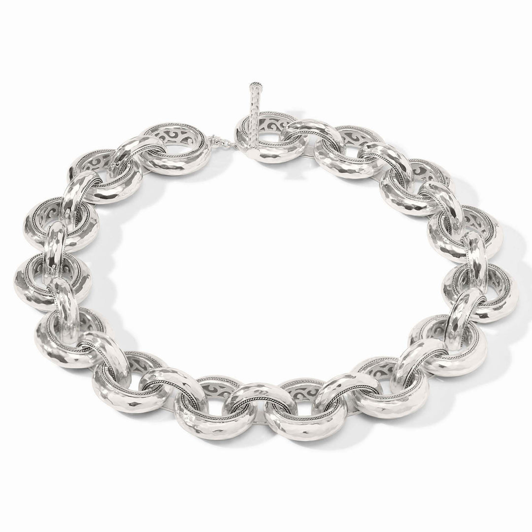 Silver hammered link necklace with a pierced inner design on a toggle clasp