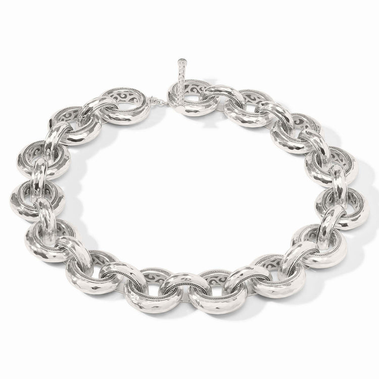 Silver hammered link necklace with a pierced inner design on a toggle clasp