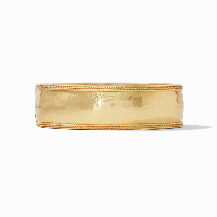 Wide gold bangle with twisted wire hinge detail