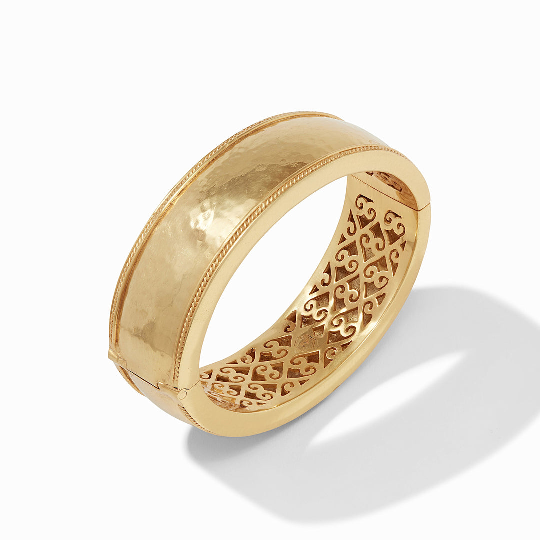Wide gold-plated bangle with twisted wire hinge detail