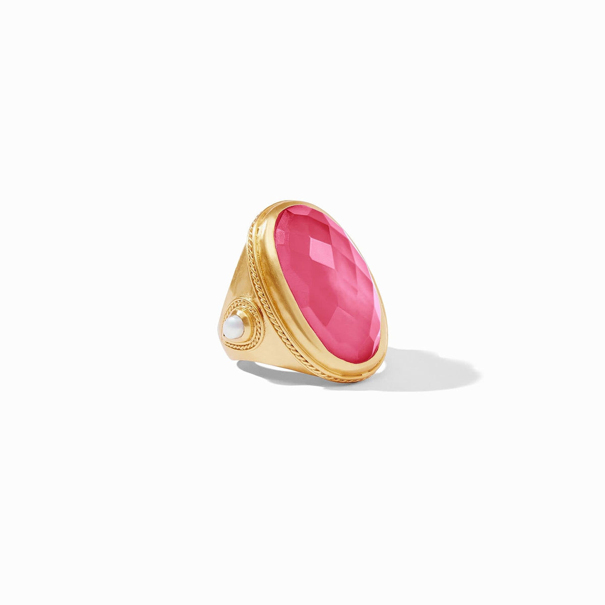 Gold-plated Cannes statement ring featuring a pear-shaped iridescent raspberry glass stone with mother-of-pearl accents and twisted wire detail.