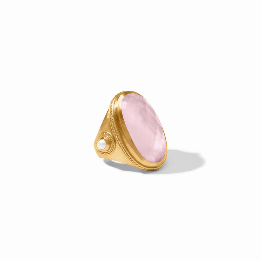 Gold-plated Cannes statement ring featuring a pear-shaped iridescent rose glass stone with mother-of-pearl accents and twisted wire detail.