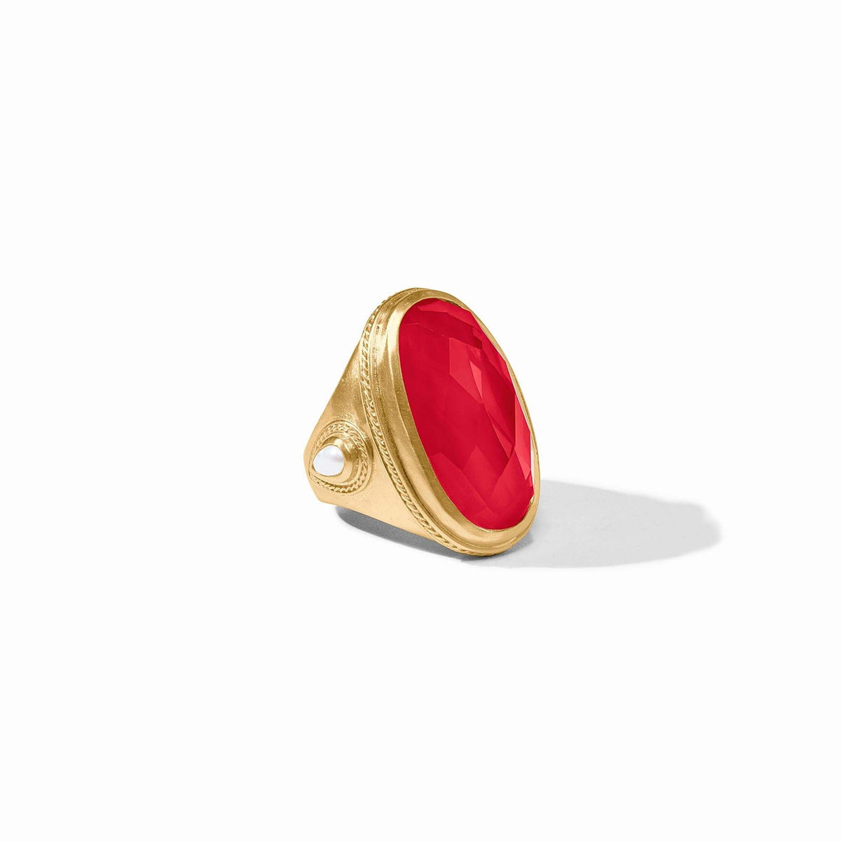 Gold-plated Cannes statement ring featuring a pear-shaped iridescent glass stone with mother-of-pearl accents and twisted wire details.